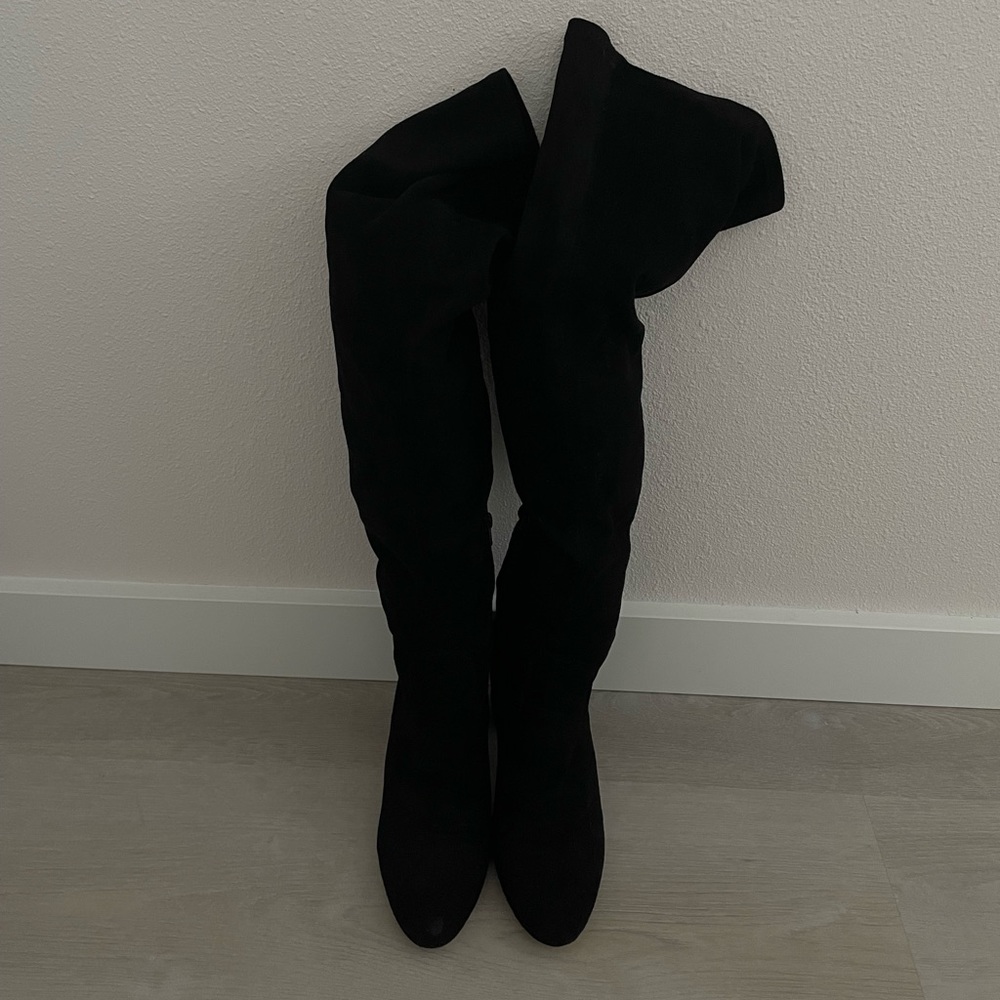 Over-the-knee black heeled boots